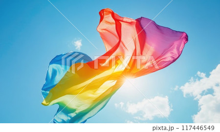 silk cloth in rainbow colors fly on blue sky background 117446549