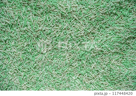 Full frame shot of tofu cat litter in sand box. Tofu cat litter is made of food-grade soy pulp that would otherwise end up in landfill. It is one of the longest lasting, easiest to clean. Full frame shot of tofu cat litter in sand box. Tofu cat litter is made of food-grade soy pulp that would otherwise end up in landfill. It is one of the longest lasting, easiest to clean. 117448420