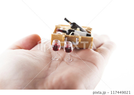image of miniature wine bottle glass white background 117449021