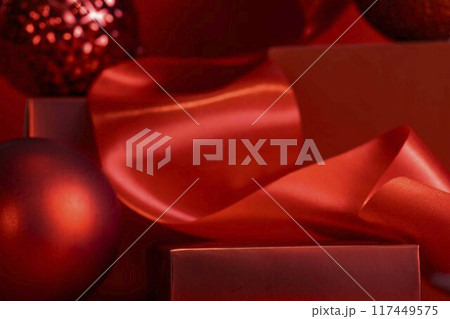 Gifting with Elegance, mockup red-themed podium presenting cosmetics as elegant Christmas gifts, combining beauty, festivity Gifting with Elegance, mockup red-themed podium presenting cosmetics as elegant Christmas gifts, combining beauty, festivity 117449575