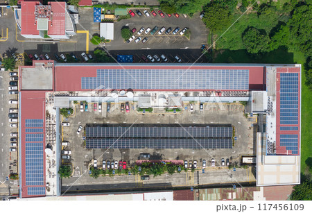 Parking lot and roof building covered with solar panels Parking lot and roof building covered with solar panels 117456109