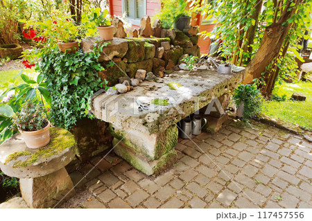 Old stone table under a tree. 117457556