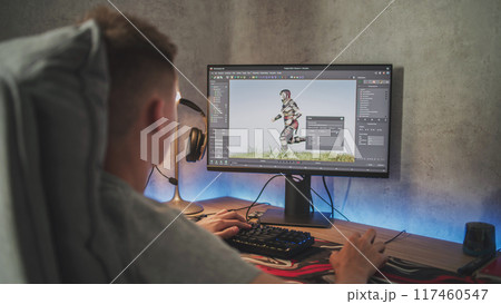Young designer creates 3D model and animation using computer Young designer creates 3D model and animation using computer 117460547