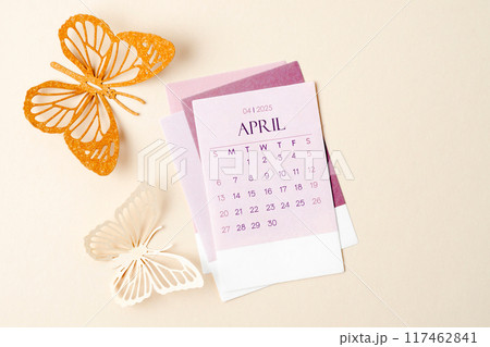 April 2025 calendar card for the organizer to plan and reminder and butterfly paper on yellow. 117462841