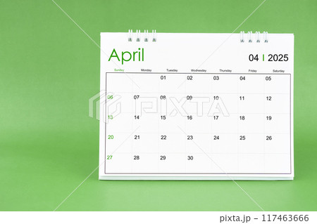 April 2025 desk calendar isolated in green background. 117463666