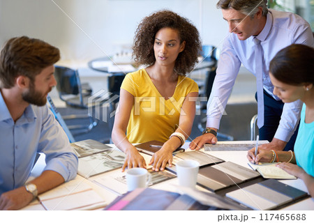 Negotiation, meeting or diverse business people with documents in office for planning and teamwork. Interior designers, global collaboration and workplace together for project review or brainstorm 117465688