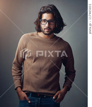 Fashion, glasses and portrait of man in studio with stylish, elegant and winter outfit. Serious, spectacles and male model from Australia with trendy, cool and designer clothes by gray background. 117465831