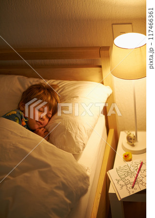 Home, kid and sleeping in bed at night to dream, tired and blanket for child development. House, bedroom and boy and nap to rest or tired with playing for physical growth, refresh and comfortable Home, kid and sleeping in bed at night to dream, tired and blanket for child development. House, bedroom and boy and nap to rest or tired with playing for physical growth, refresh and comfortable 117466361