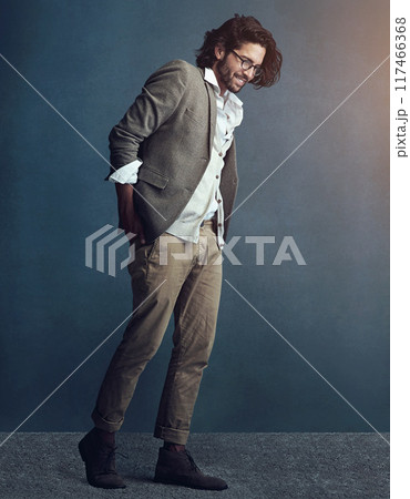 Charming, businessman and hands in pocket with messy suit for fashion trend isolated in studio. Smile, male person and creative professional with pride and ambition in job with mockup and lens flare Charming, businessman and hands in pocket with messy suit for fashion trend isolated in studio. Smile, male person and creative professional with pride and ambition in job with mockup and lens flare 117466368