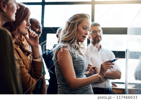 Presentation, writing and meeting with business woman and whiteboard for teamwork, training or project management. Idea, strategy and discussion for startup employees in office for brainstorming 117466633