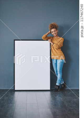 Happy, banner and portrait of woman on wall background for news, announcement and review. Mockup space, social media and person with sign, billboard or poster for information or advertising in studio 117467240