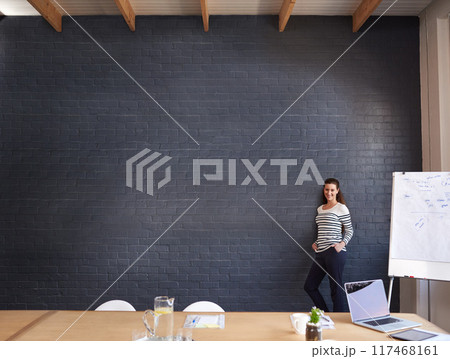Business woman, portrait and wall with whiteboard for presentation, coaching or conference at office. Young female person, creative employee or presenter on mockup space for communication or startup 117468161