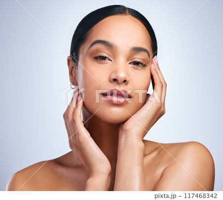 Woman, portrait and clear skincare in studio, healthy and hands for beauty on white background. Female person, cosmetics and touch soft or smooth skin, facial treatment and foundation for dermatology Woman, portrait and clear skincare in studio, healthy and hands for beauty on white background. Female person, cosmetics and touch soft or smooth skin, facial treatment and foundation for dermatology 117468342