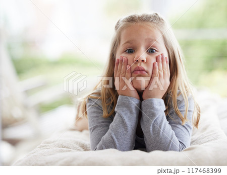 Portrait, child and bored from adhd on bed for relax, holiday and young girl for weekend in home. Kid, hands and fatigue in bedroom with youth insomnia, tired and comfortable in house for rest Portrait, child and bored from adhd on bed for relax, holiday and young girl for weekend in home. Kid, hands and fatigue in bedroom with youth insomnia, tired and comfortable in house for rest 117468399