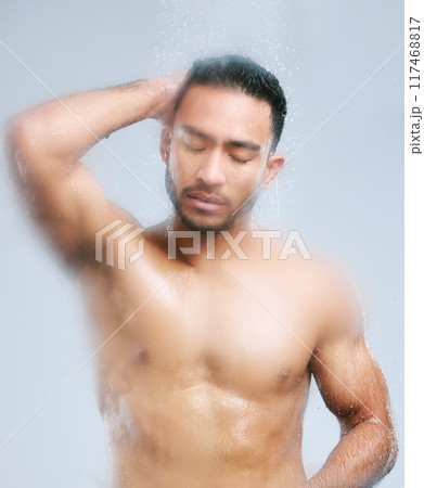 Cosmetics, man and washing body for hygiene, grooming and self care or cleaning in studio grey background. Wellness, male person and water with soap showering for health treatment and dermatology Cosmetics, man and washing body for hygiene, grooming and self care or cleaning in studio grey background. Wellness, male person and water with soap showering for health treatment and dermatology 117468817