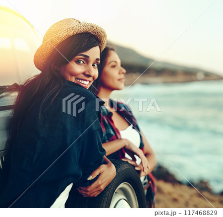 Car, portrait and women at a beach for road trip pause, break and bonding at sunset on vacation in nature. Sunrise, travel or girl friends at ocean for summer, holiday or adventure, journey or trip 117468829