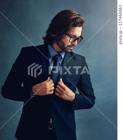 Fashion, formal or suit with business man in studio on gray wall background for professional career. Corporate, jacket and style with confident employee or in work outfit for class, elegance or power 117468861