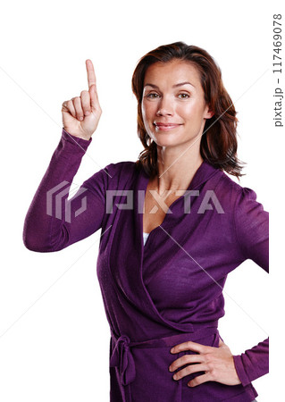 Hand, portrait and woman pointing in studio with discount or promotion for fashion or product placement. Happy, female person and gesture by white background for information and advertisement 117469078