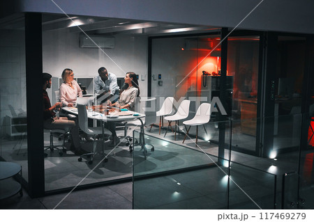 Business people, laptop and discussion for design at night in office, creative agency and overtime food for project. Teamwork, support and problem solving in pizza meeting for deadline and planning 117469279