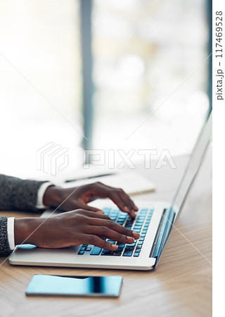 Man, hand and laptop or working with smartphone, online business and website design for creative career. Digital, entrepreneur and keyboard typing for programming on internet, app and networking 117469528