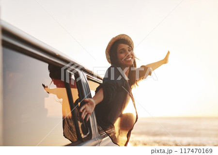 Road trip, woman and freedom portrait in car with smile, van and travel for holiday and vacation. Transport, parking and adventure with idea and in summer with driving and journey with driver Road trip, woman and freedom portrait in car with smile, van and travel for holiday and vacation. Transport, parking and adventure with idea and in summer with driving and journey with driver 117470169