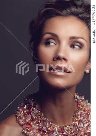 Rich woman, thinking and vintage necklace on studio background for fashion, beauty and luxury pearls. Mature person, wealth and vision for glamour or designer jewelry, chain and accessory with makeup Rich woman, thinking and vintage necklace on studio background for fashion, beauty and luxury pearls. Mature person, wealth and vision for glamour or designer jewelry, chain and accessory with makeup 117470538