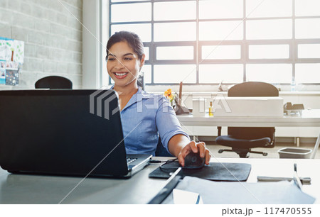 Happy, business woman and laptop with accountant at desk for career in finance, research or development at office. Young female person or financial advisor with smile on computer for job at workplace Happy, business woman and laptop with accountant at desk for career in finance, research or development at office. Young female person or financial advisor with smile on computer for job at workplace 117470555