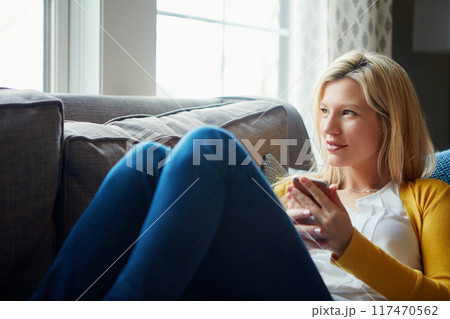 Morning, thinking and woman in living room, phone and rest on couch, smile and social media in house. Relax, calm and girl with mobile, happy and peace in lounge, cozy and person in apartment Morning, thinking and woman in living room, phone and rest on couch, smile and social media in house. Relax, calm and girl with mobile, happy and peace in lounge, cozy and person in apartment 117470562
