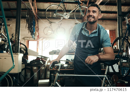 Man, bicycle shop and thinking for maintenance work, startup with transport service. Bike, mechanic and Male entrepreneur in workshop with idea, thoughtful for sustainable business with happiness 117470615