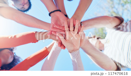 Friends, people and hands together with low angle outdoor for teamwork, unity and support in nature. Group, team building and solidarity for collaboration, partnership and motivation with diversity 117470618