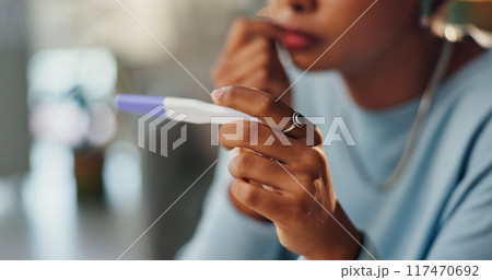 Stress, check pregnancy test and hands of woman for infertility crisis, anxiety and bad news in bathroom. Female person, upset and stick for pregnant result with feeling scared and regret for mistake 117470692