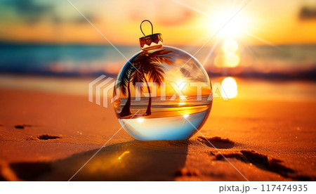 Transparent Glass Christmas Ball on a Sandy Beach of a Tropical Sea - Generative Ai 117474935