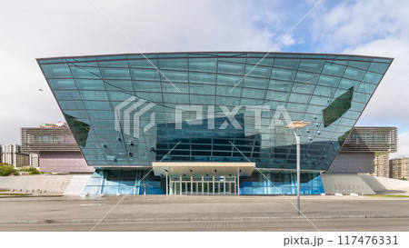 Baku Convention Center showcases modern architecture in Baku, Azerbaijan under a cloudy sky 117476331