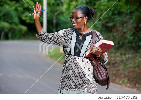 portrait of young woman, smiling. portrait of young woman, smiling. 117477282