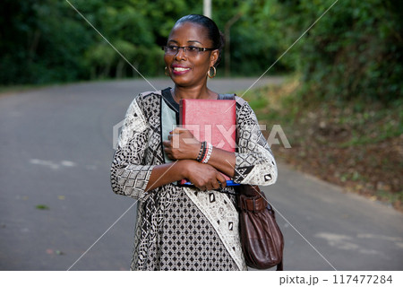 portrait of young woman, smiling. portrait of young woman, smiling. 117477284