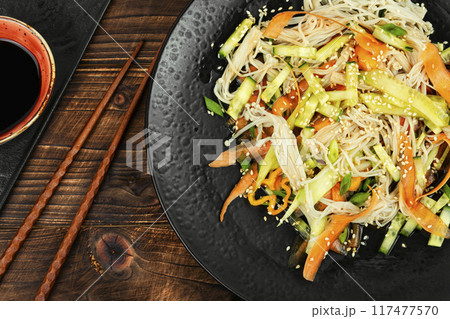 Enoki mushroom spicy salad. 117477570