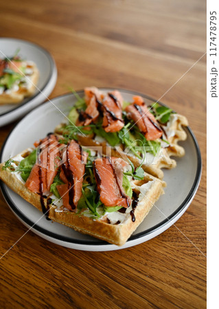 healthy sandwich with cream cheese, red fish and avocado for breakfast 117478795