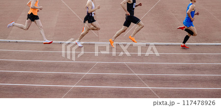 group men athlete running 800 metres race in stadium group men athlete running 800 metres race in stadium 117478926