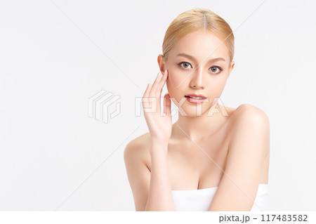 Beautiful young asian woman with clean fresh skin on white background, Face care, Facial treatment, Cosmetology, beauty and spa, Asian women portrait. Beautiful young asian woman with clean fresh skin on white background, Face care, Facial treatment, Cosmetology, beauty and spa, Asian women portrait. 117483582