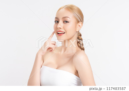 Beautiful young asian woman with clean fresh skin on white background, Face care, Facial treatment, Cosmetology, beauty and spa, Asian women portrait. Beautiful young asian woman with clean fresh skin on white background, Face care, Facial treatment, Cosmetology, beauty and spa, Asian women portrait. 117483587