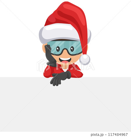 Industrial mechanic worker with Santa Claus hat holding a sign with copy space for text for advertising, presentation, brochures. Industrial safety and occupational health at work Industrial mechanic worker with Santa Claus hat holding a sign with copy space for text for advertising, presentation, brochures. Industrial safety and occupational health at work 117484967