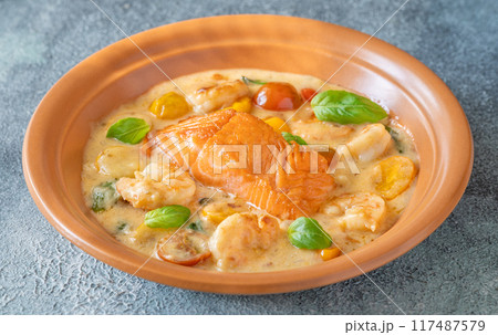 Coconut prawn salmon 117487579