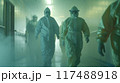 Medical professionals in hazmat suits walk through fog-filled hospital corridor 117488918