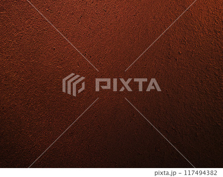 濃く暗い赤茶色の土壁のなかに藁の風合いが残る表面の横長の背景画像 濃く暗い赤茶色の土壁のなかに藁の風合いが残る表面の横長の背景画像 117494382