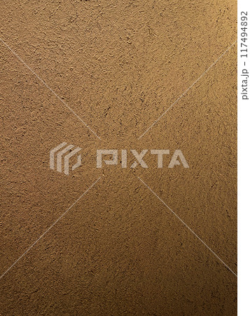 茶色の土壁のなかに藁の風合いが残る表面の縦長の背景画像 茶色の土壁のなかに藁の風合いが残る表面の縦長の背景画像 117494892