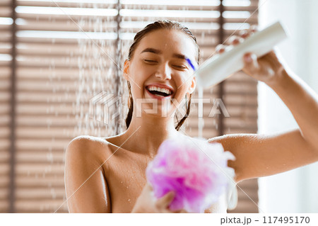 Millennial Woman Taking Shower, Putting Gel On Sponge, Free Space 117495170
