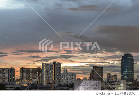 Night city view of Dramatic sky over Large Metropolitan after sunset. Night city view of Dramatic sky over Large Metropolitan after sunset. 117495876