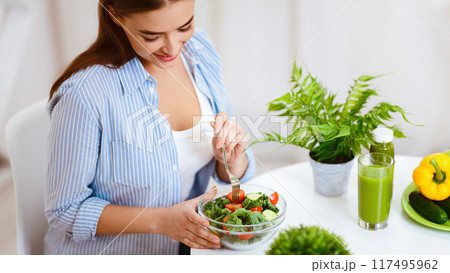 Healthy Dinner. Woman Eating Vegetable Salad At Home Kitchen, Crop Healthy Dinner. Woman Eating Vegetable Salad At Home Kitchen, Crop 117495962