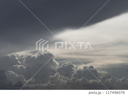 The sky is being covered with amazing clouds. 117496076