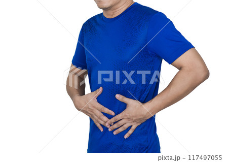 A man has a stomachache and holds his stomach with his hand. 117497055